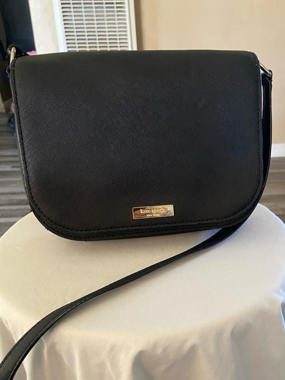 kate spade Black Crossbody Saddle Bag with Gold Logo
